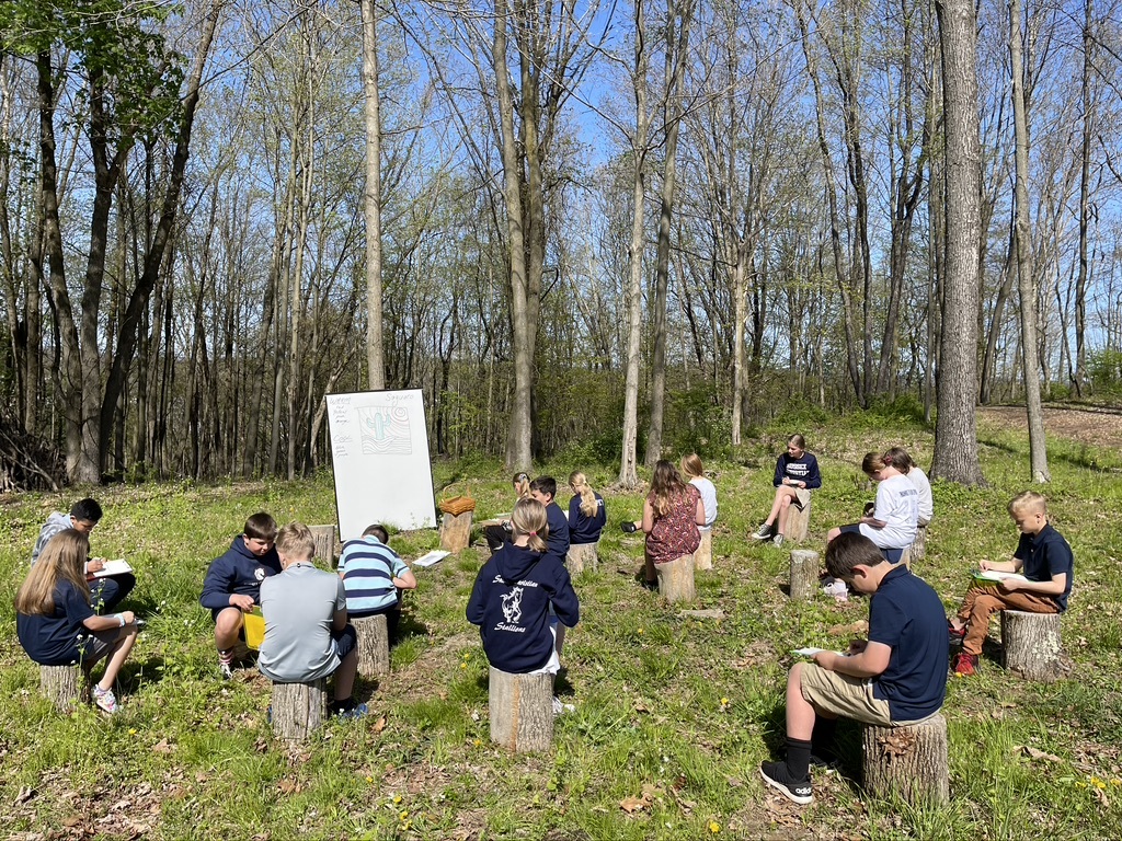 group of students learning in outdoor classroom